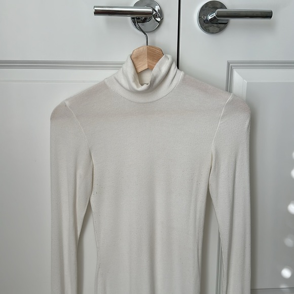 White ribbed turtleneck sweater. A bit sheer but great for layering. - Picture 2 of 4